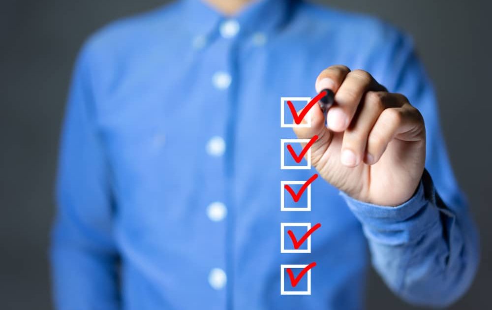 Checklist,Concept,,Businessman,Checking,Mark,On,The,Check,Boxes,With