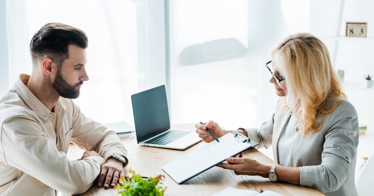 man and woman working together