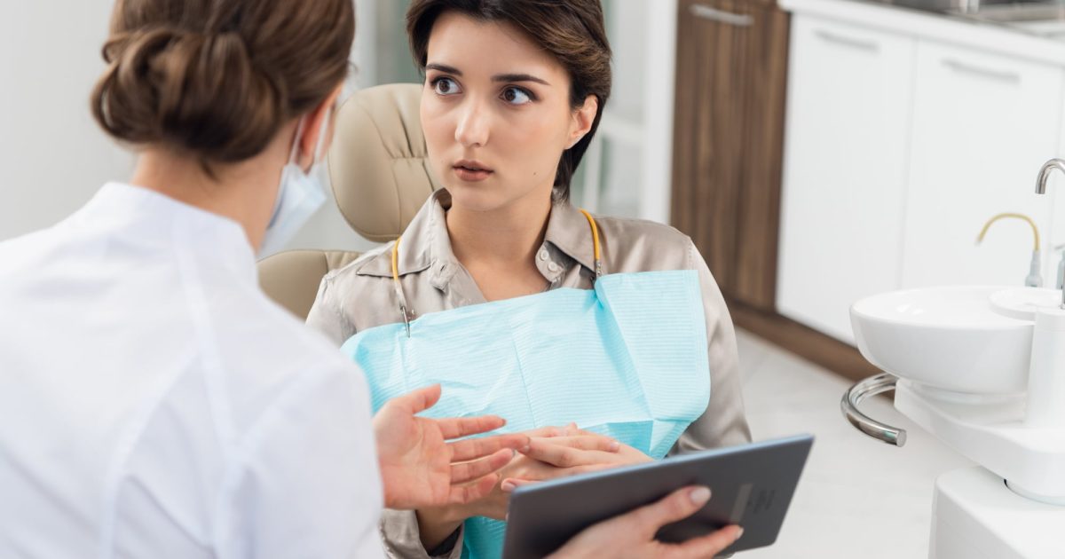 female patient at dentist office